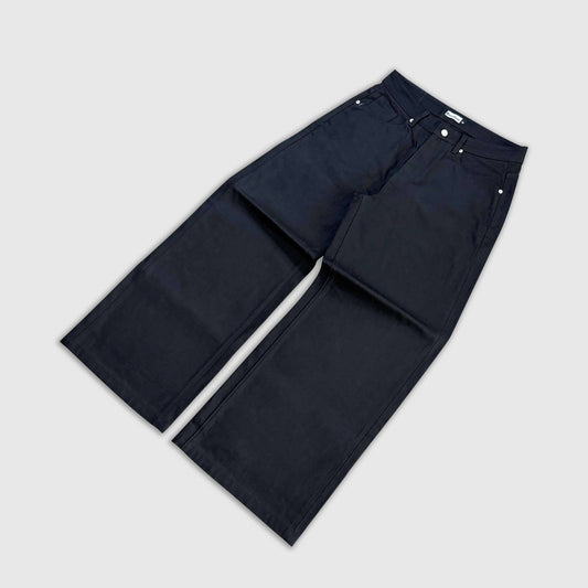 Person styled in Bareline Clothing basics, emphasizing simplicity and comfort