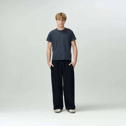 Person styled in Bareline Clothing basics, emphasizing simplicity and comfort