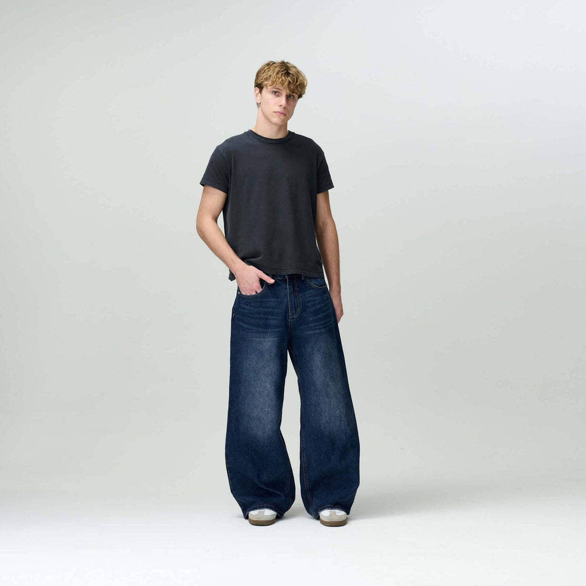 Person styled in Bareline Clothing basics, emphasizing simplicity and comfort