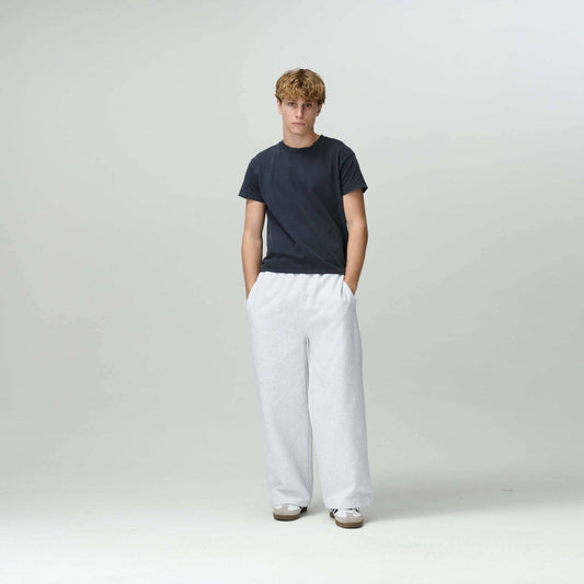 Person styled in Bareline Clothing basics, emphasizing simplicity and comfort